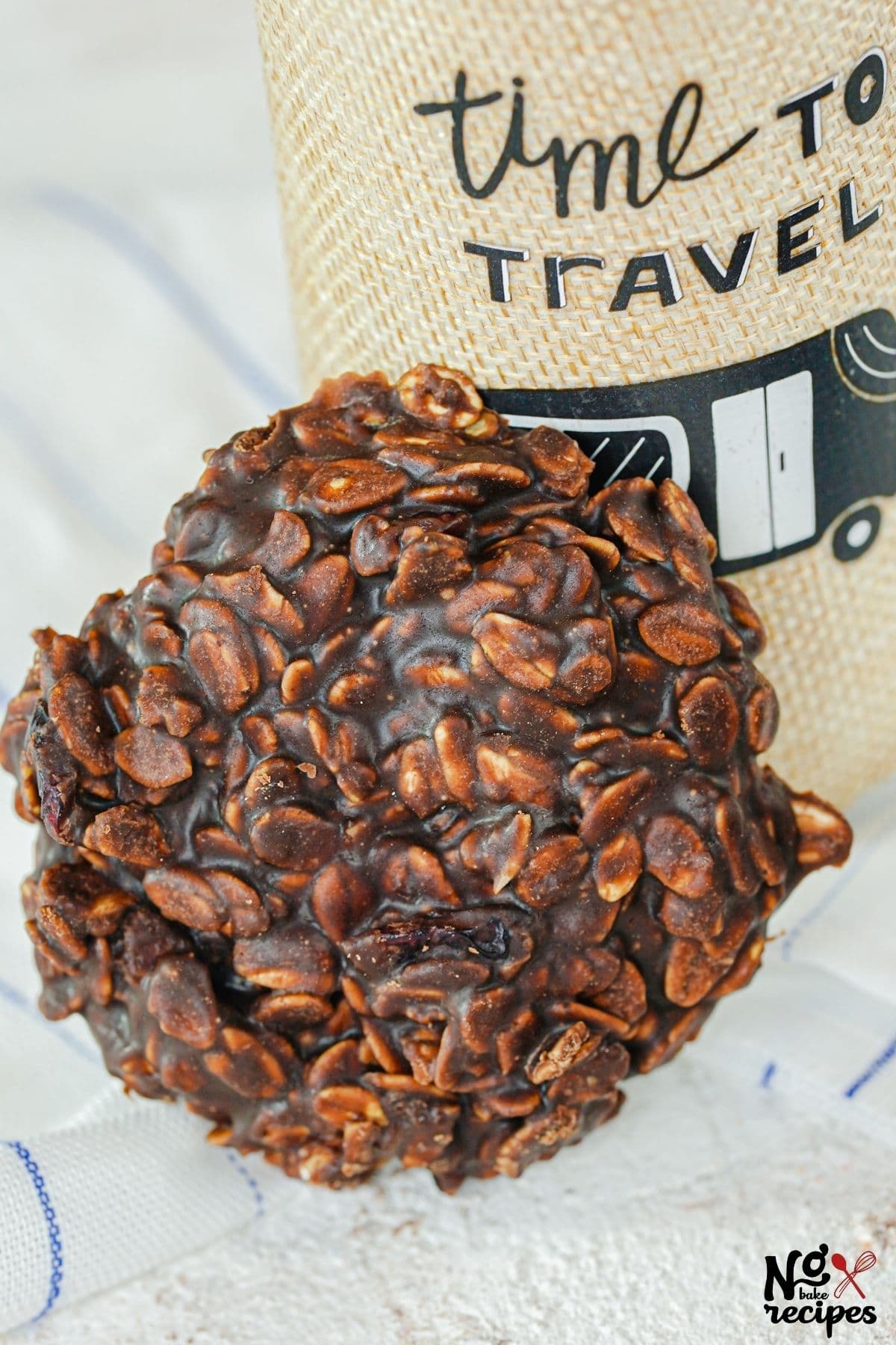 no bake cookie propped against brown travel mug