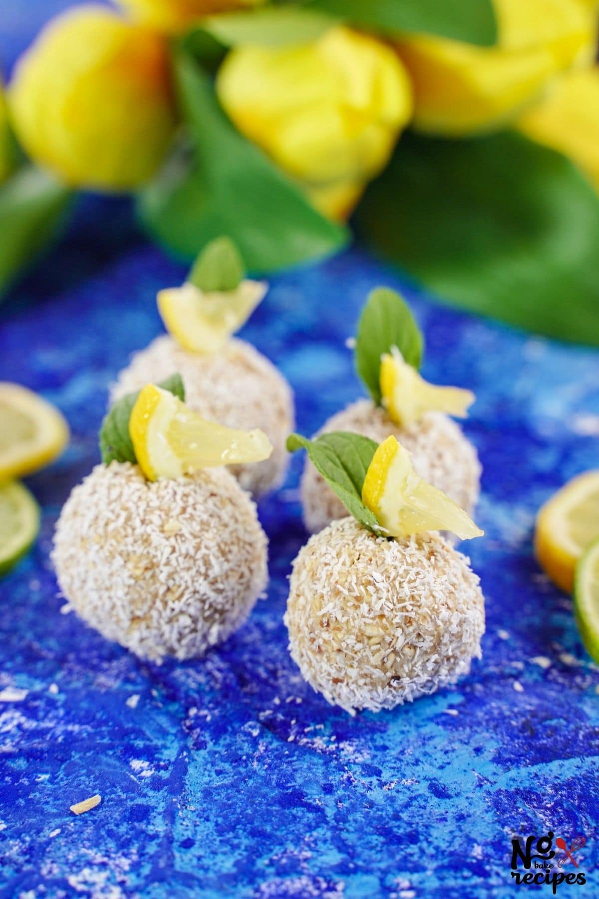 blue tablecloth with lemon truffles on top