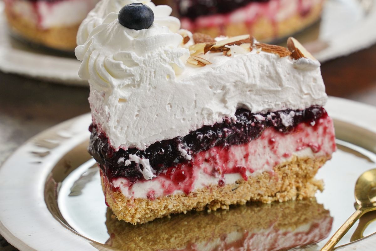 slice of blueberry cheesecake on plate