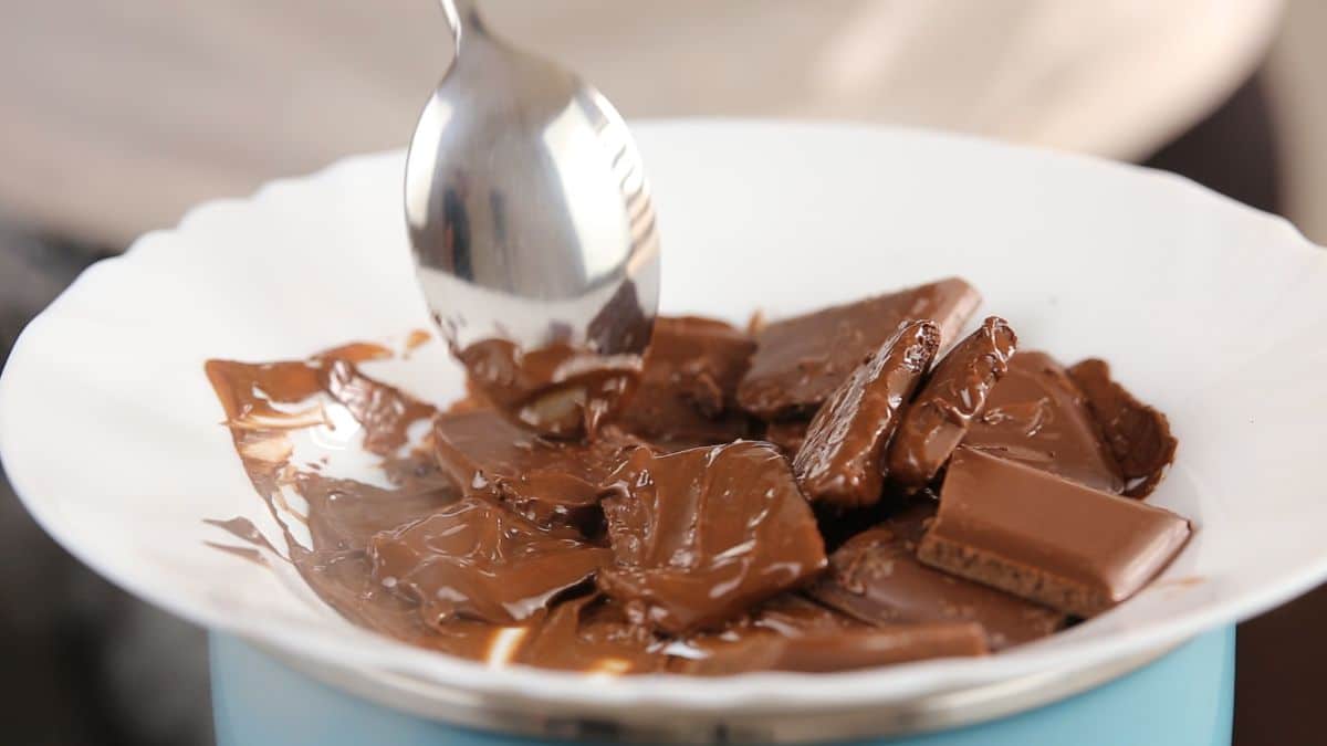 Melt few pieces of chocolates into the microwave oven until its liquid