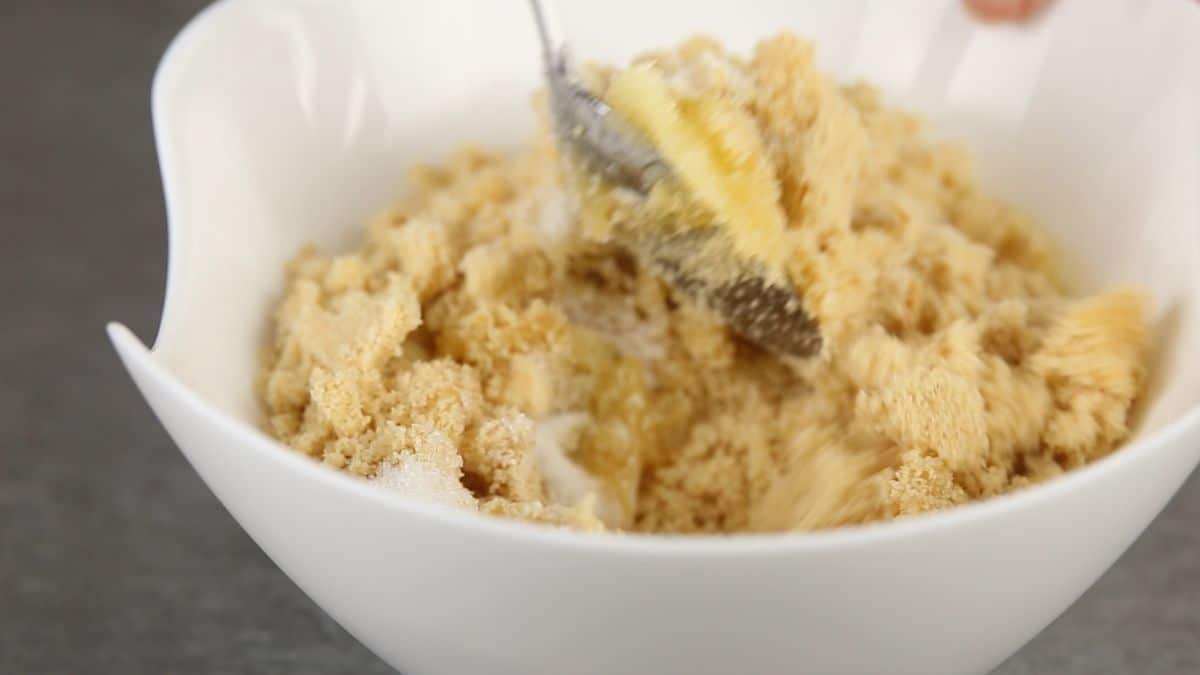 cookie crumbs and butter in white bowl