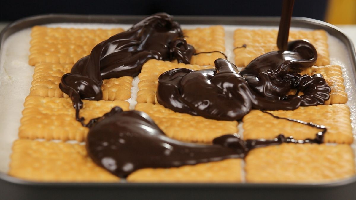 dollops of chocolate on top of cookies