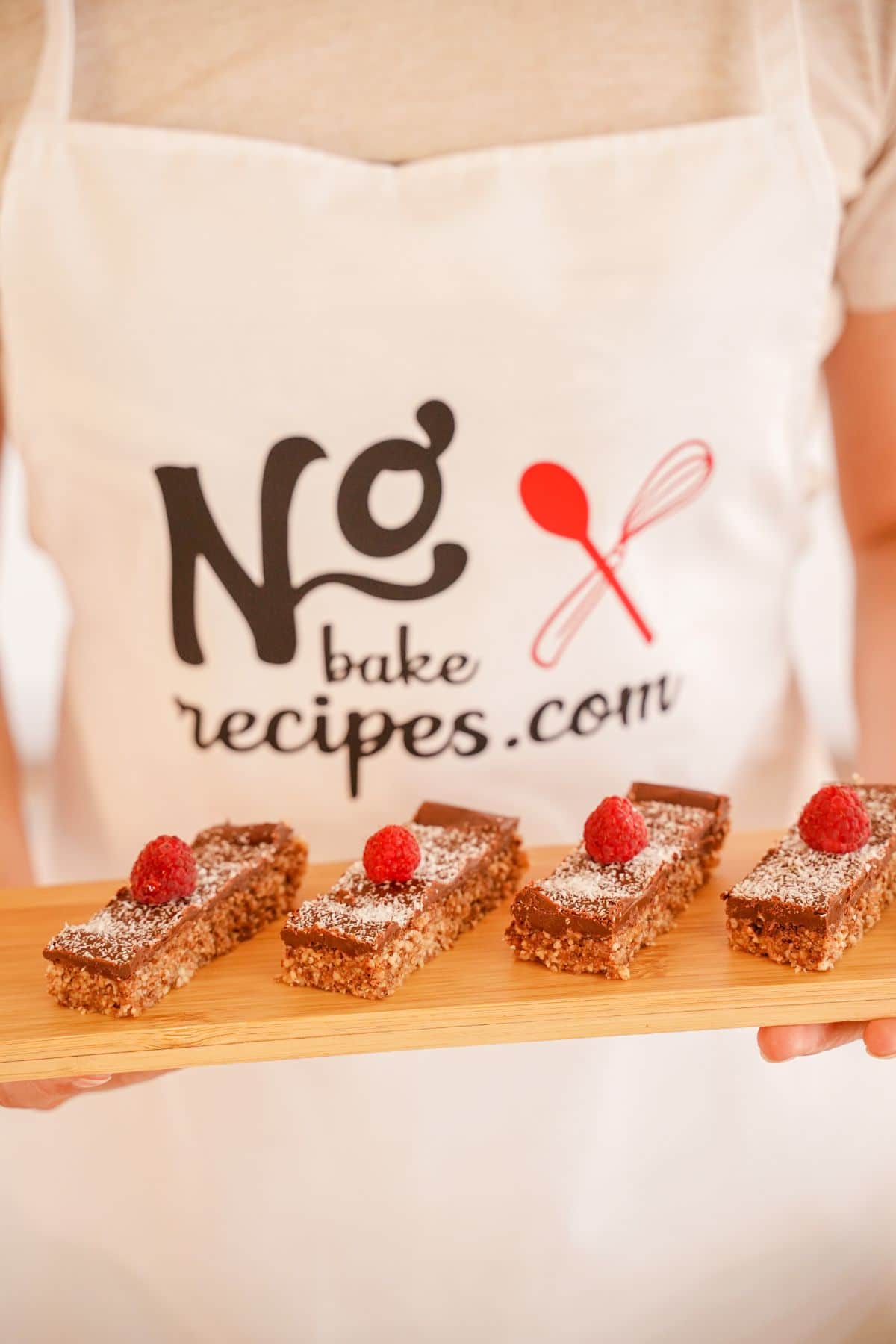 No-Bake Toasted Coconut and Almond Granola Bars served on a wooden plater