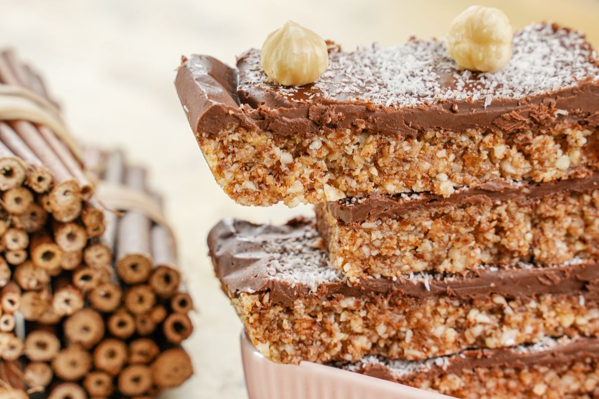 Side image of No-Bake Toasted Coconut and Almond Granola Bars placed one over the other