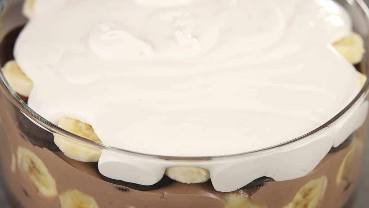 trifle bowl with whipped cream on top