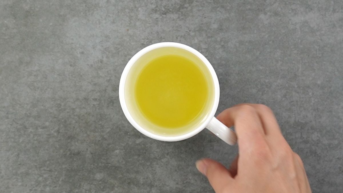 Melted butter in a cup