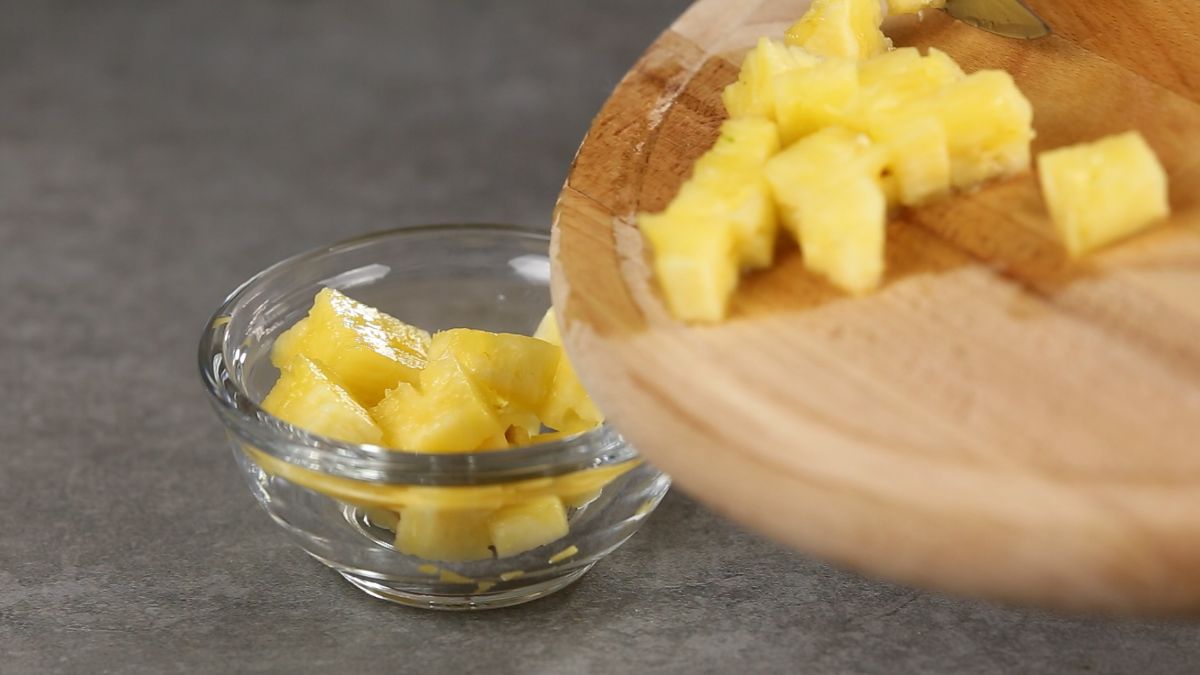 Cut Pineapple into slices