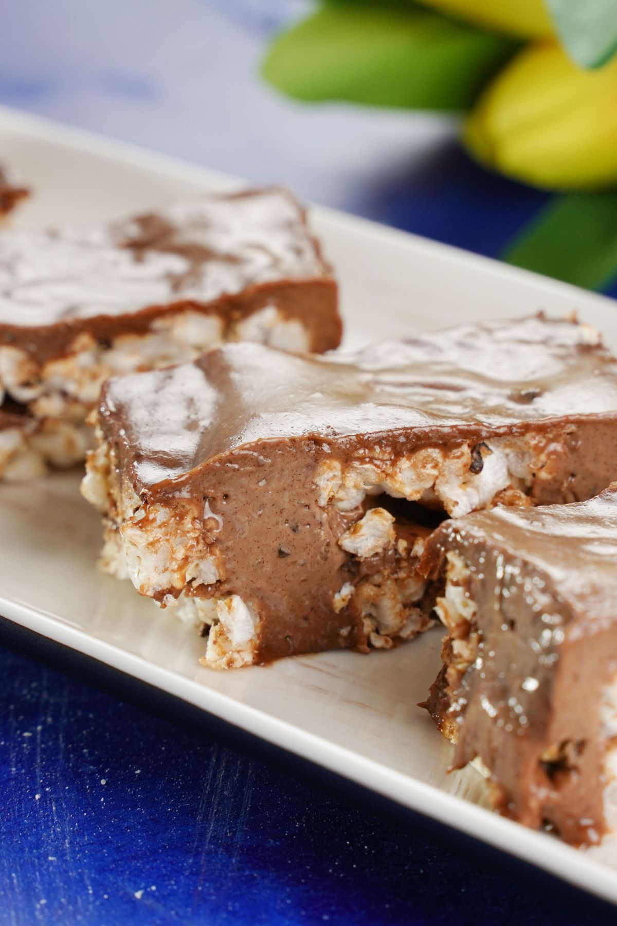 chocolate rice cake bars on a white plate