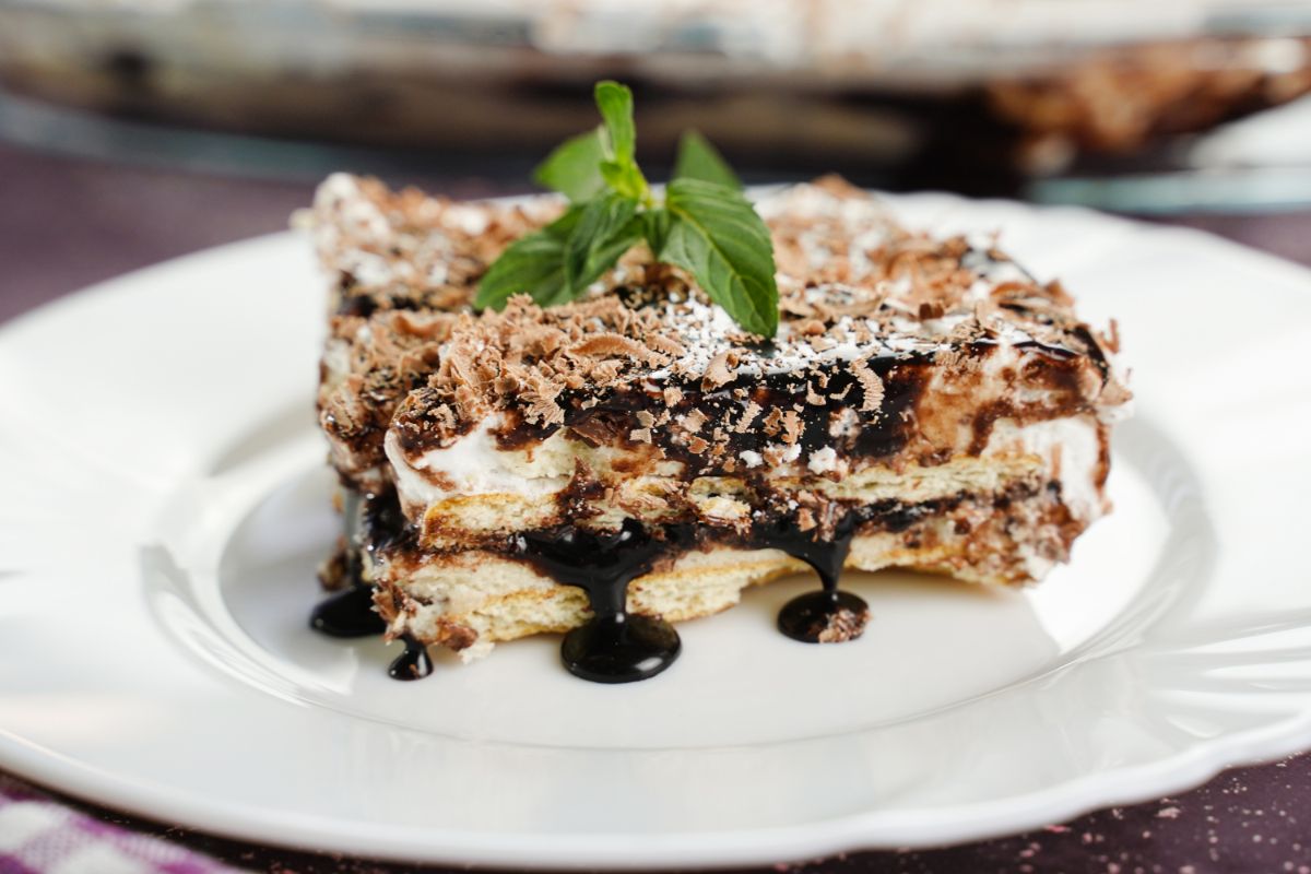 A piece of Cookie Dough Lasagna in a plate