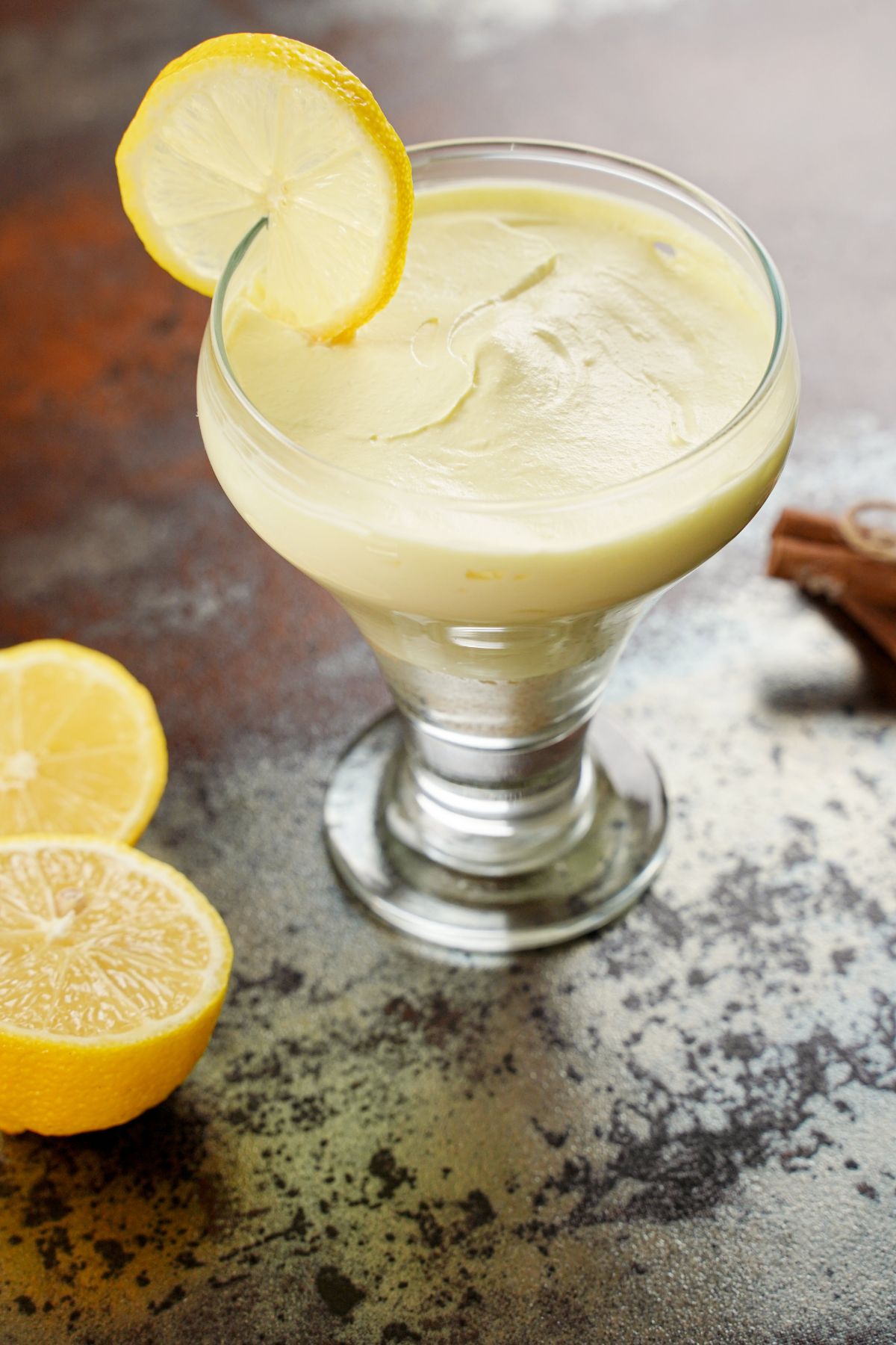 side view image of Creamy Lemon Mousse served in a glass