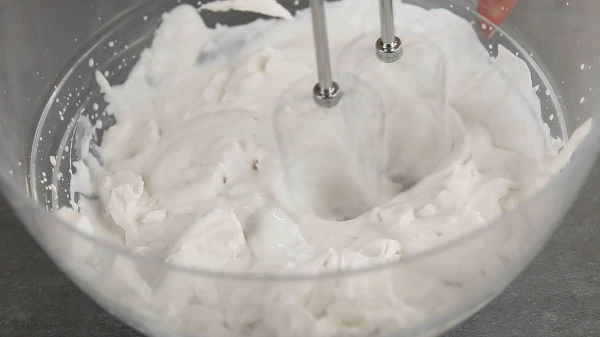mix cream cheese, coconut cream and coconut extracts in a bowl