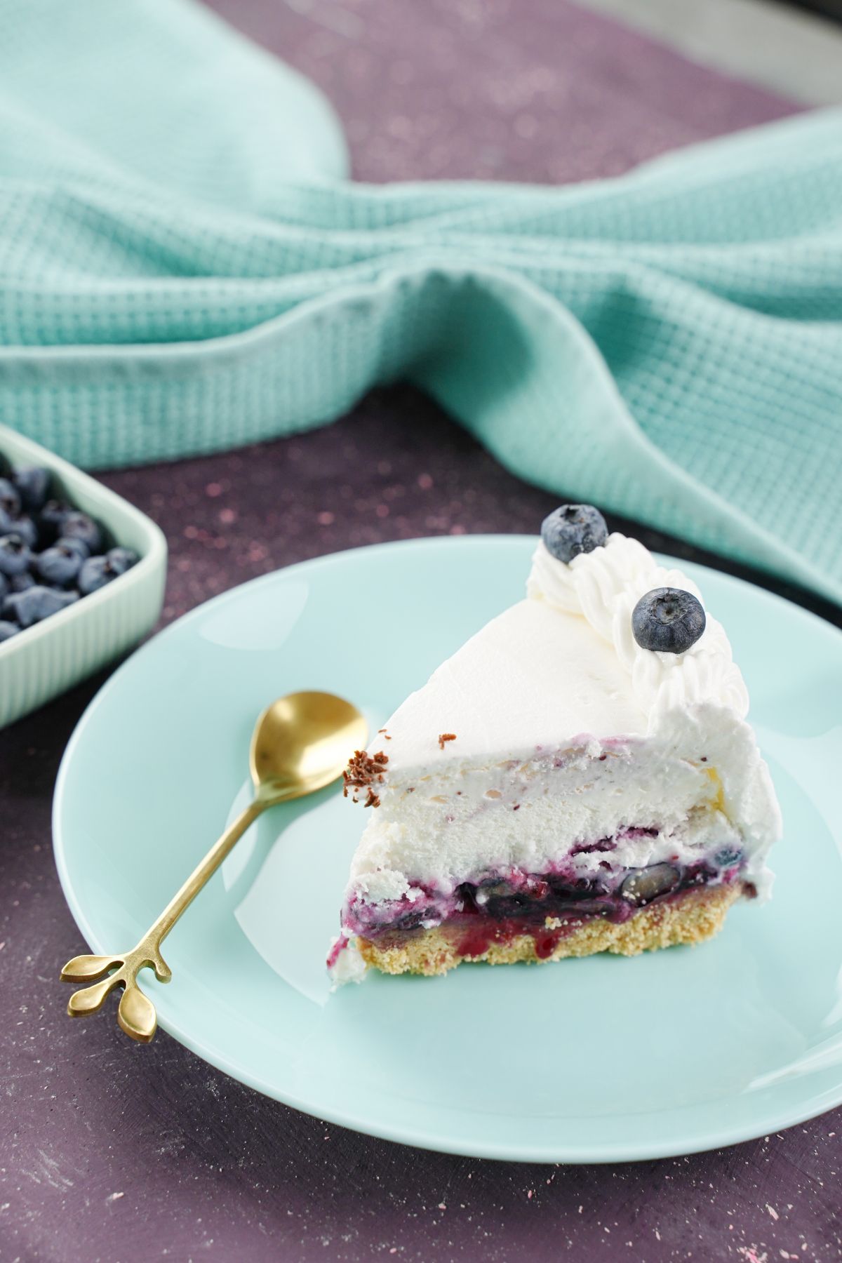 No-Bake Blueberry Pie served in a plate with golden spoon