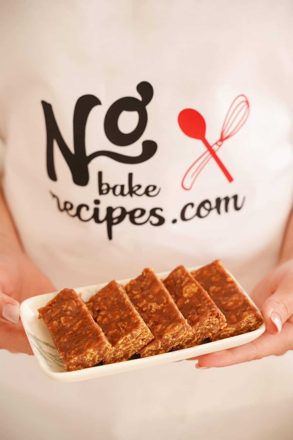 No-Bake Chocolate Cereal Bars served on a white tray