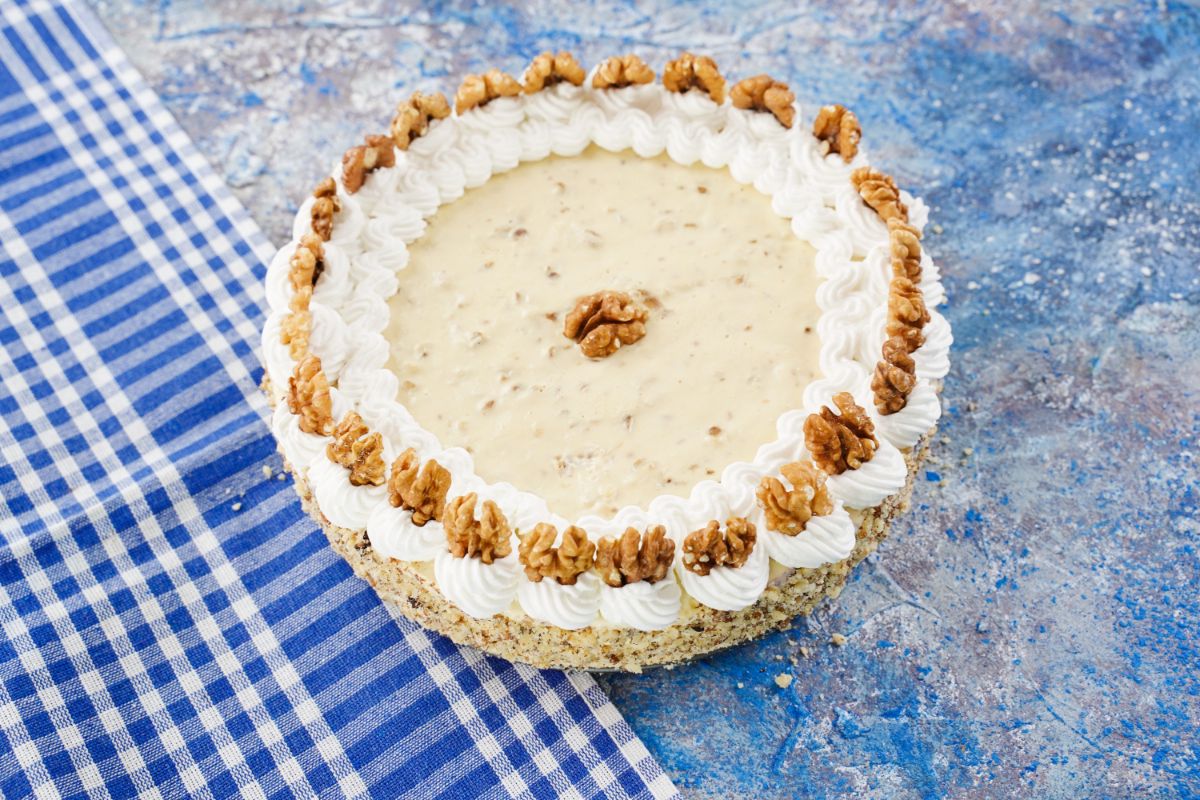 decorate the cake with walnut pieces