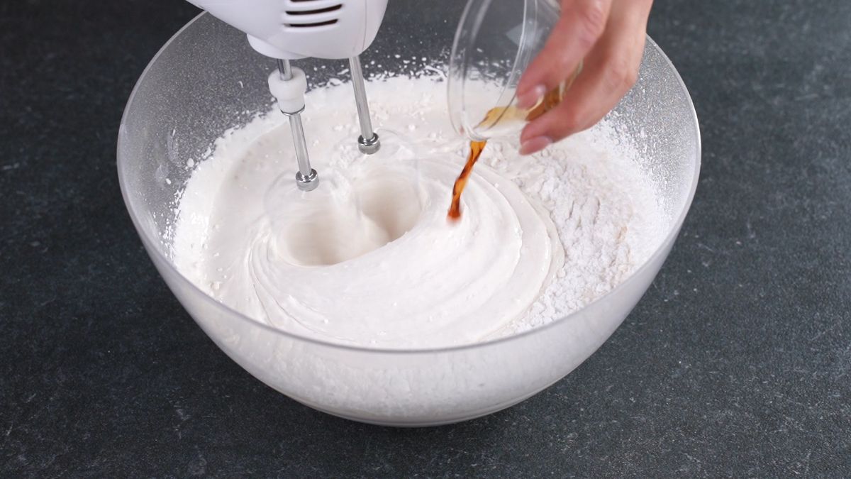 mix heavy cream with vanilla and powdered sugar