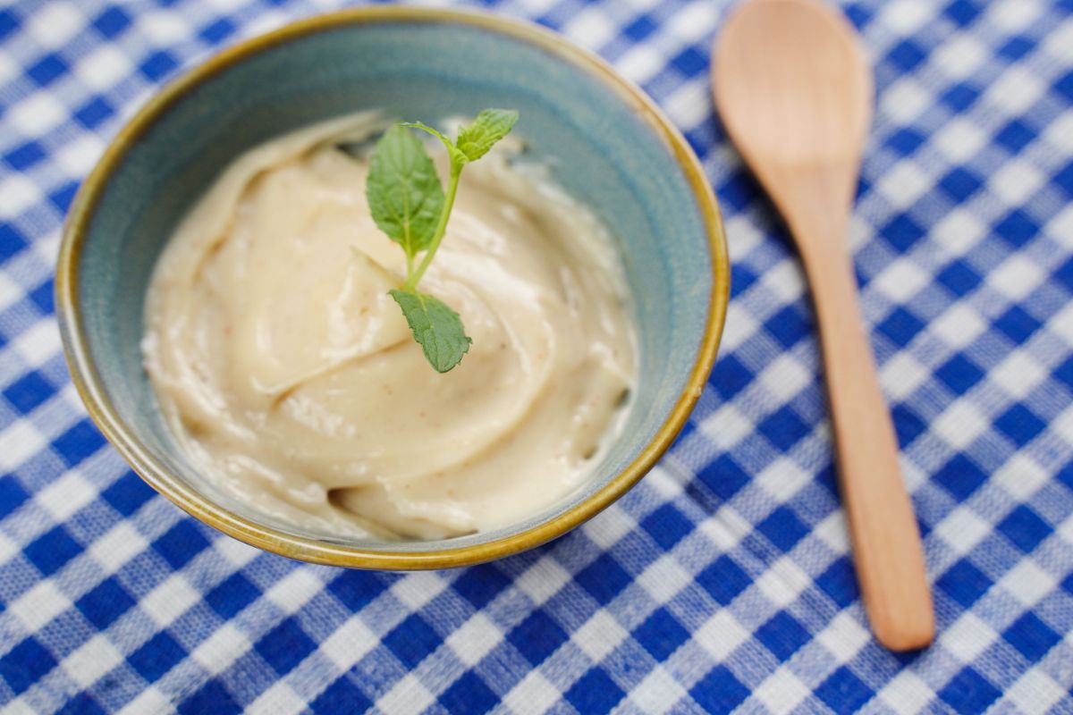 Creamy Peanut Butter Pudding with mint leaf