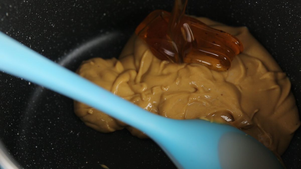 melt peanut butter and honey in a pan
