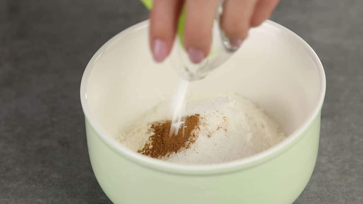 mix flour, sugar, baking powder and cinnamon in a dish