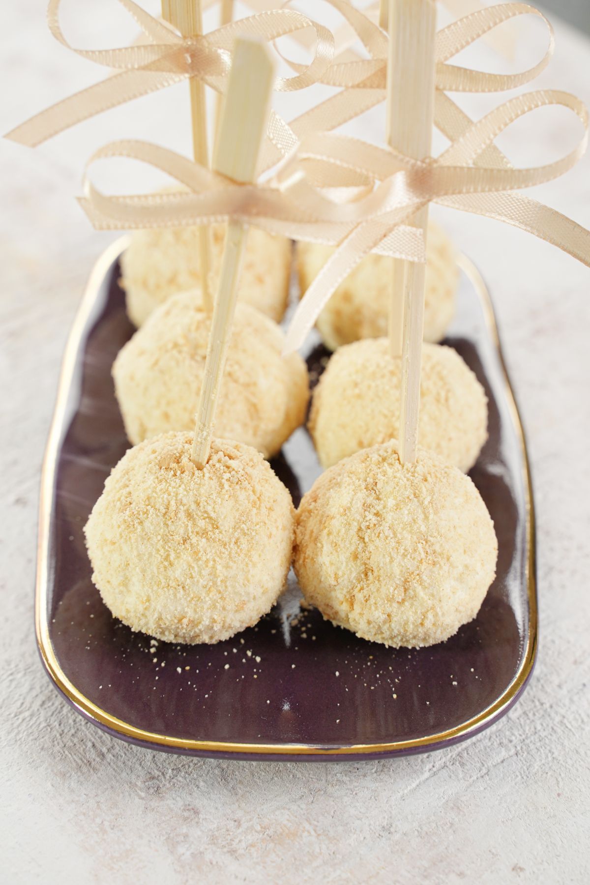 White Chocolate Cheesecake Pops in a tray
