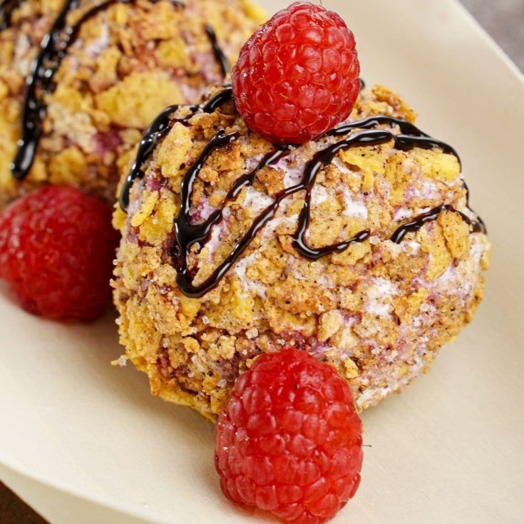 Fried ice cream balls served with raspberries.