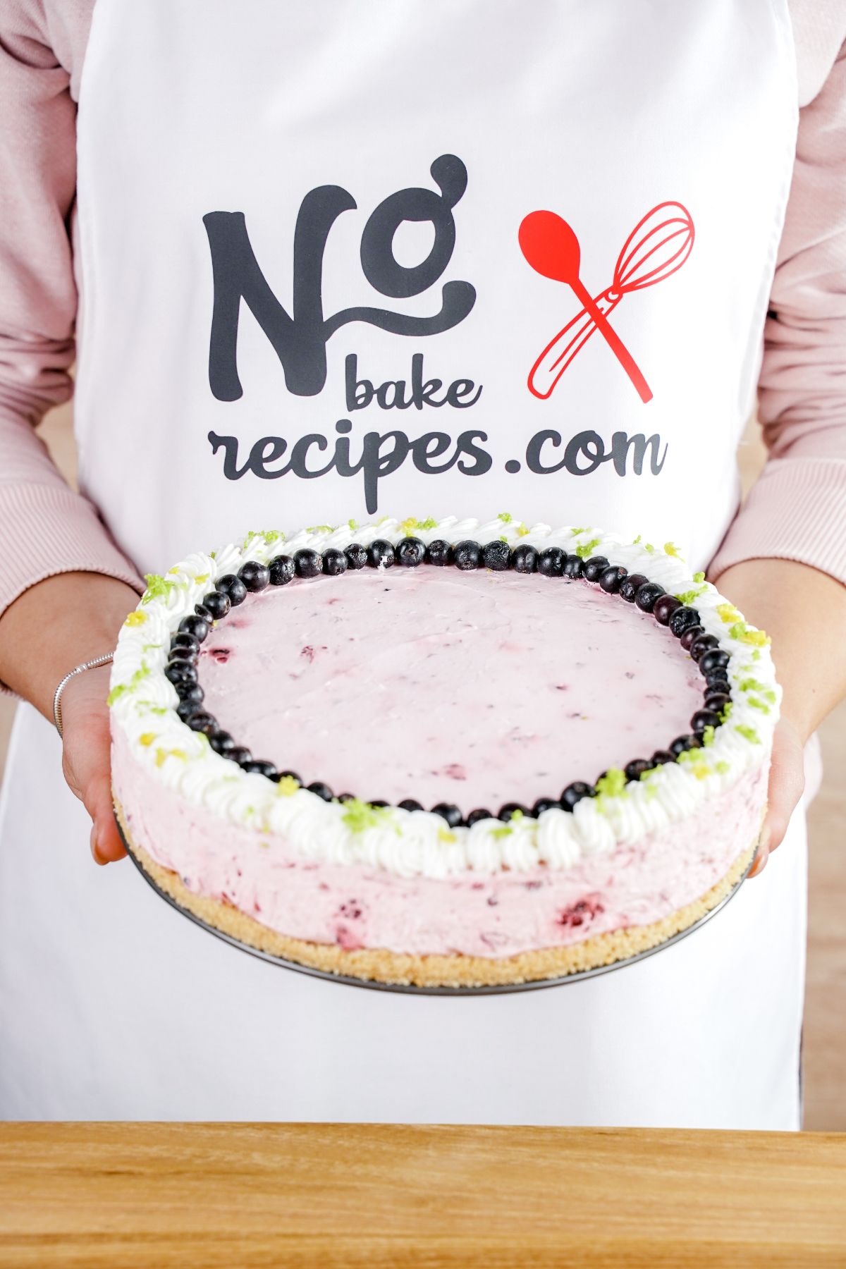 No-Bake Fruit Smoothie Cheesecake in hand