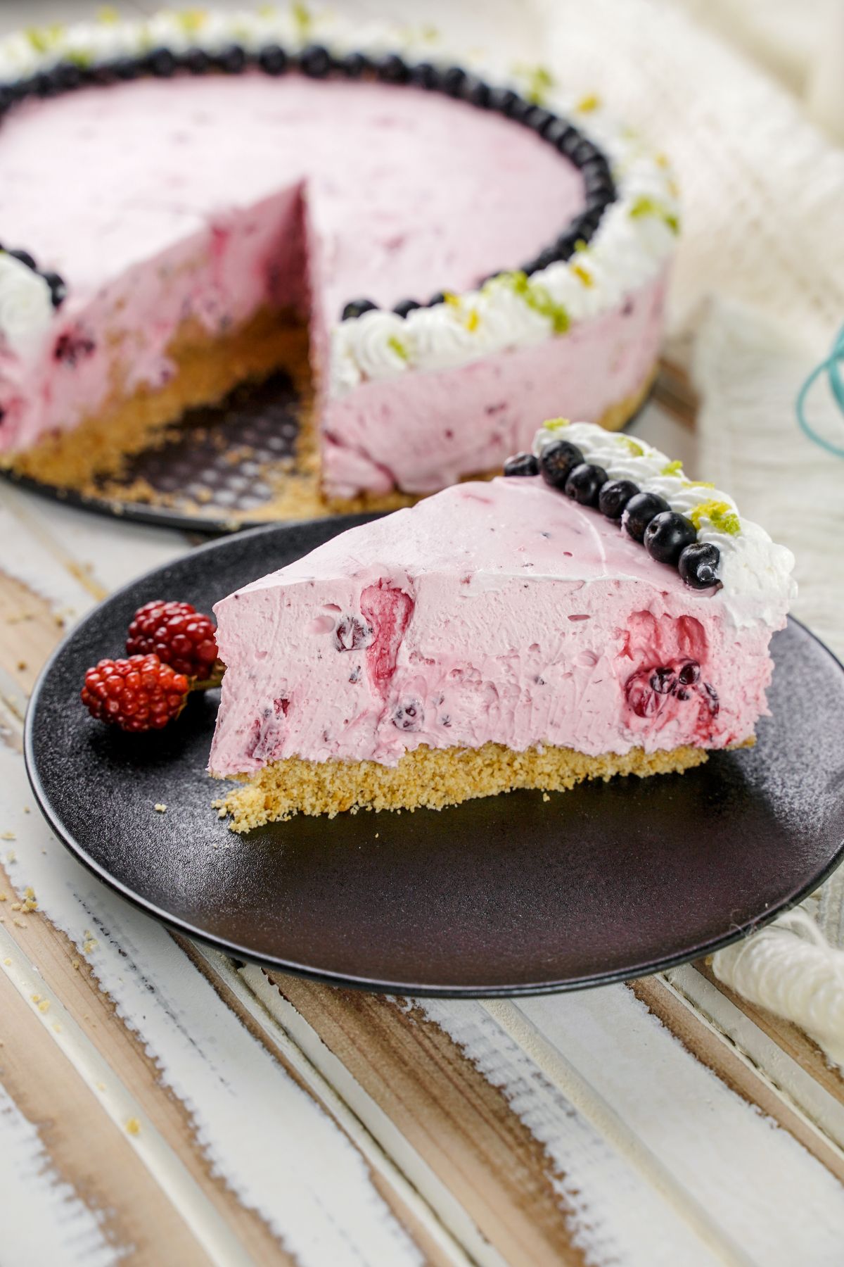 A piece of No-Bake Fruit Smoothie Cheesecake