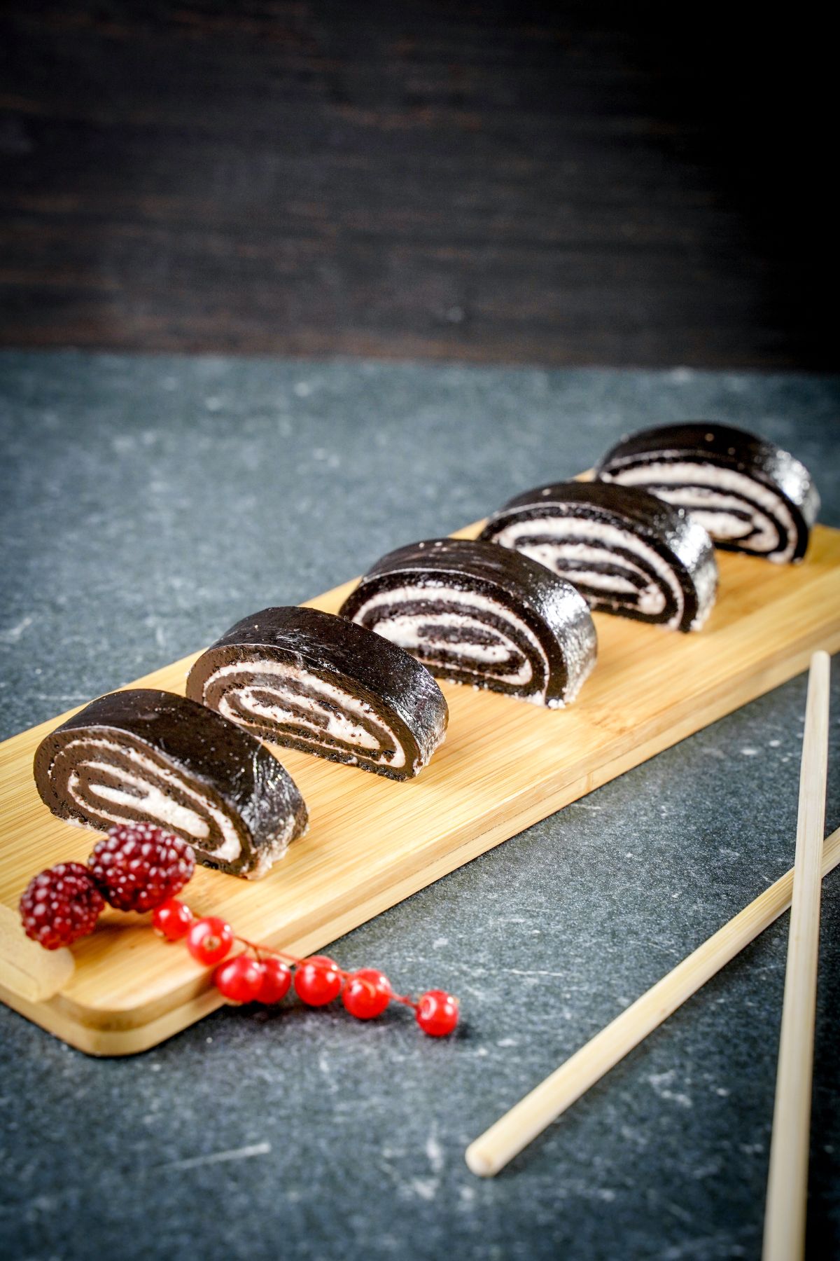 No-Bake Oreo Sushi served on a wooden plater