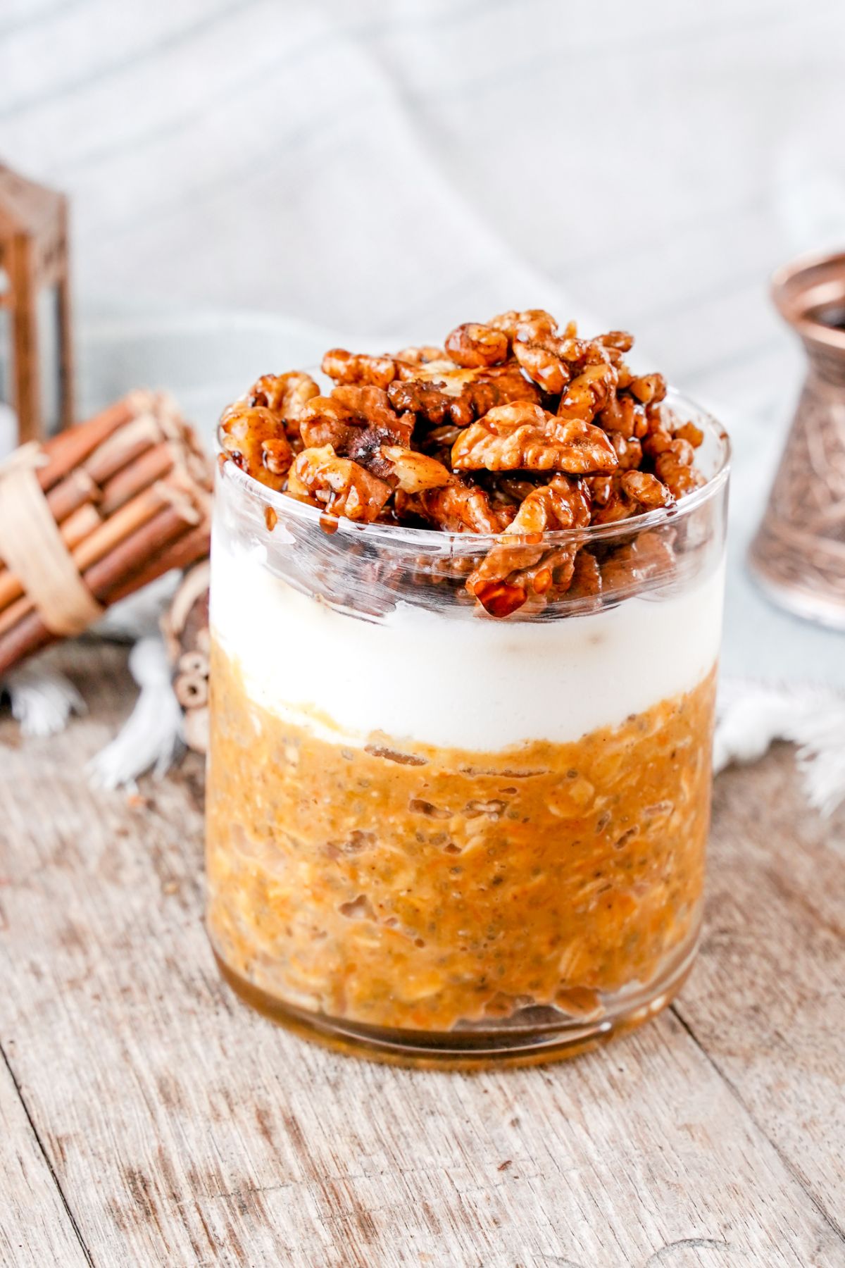 Side view image of Pumpkin Pie Overnight Oats served in a jar