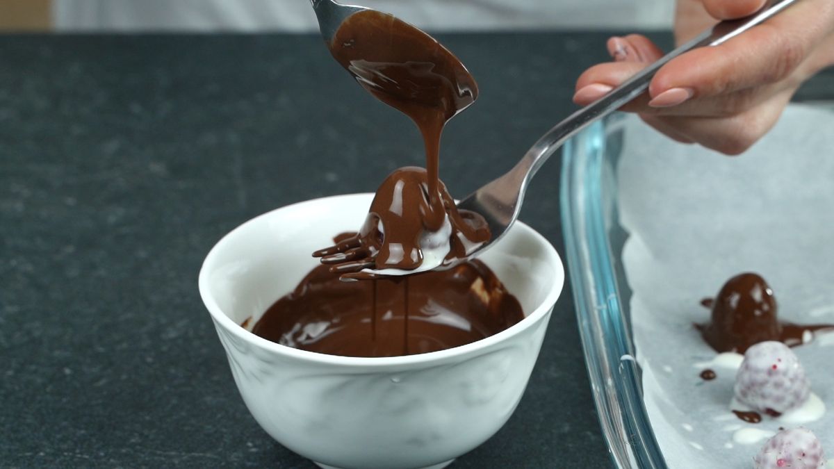pour the dark chocolate over the white chocolate layer