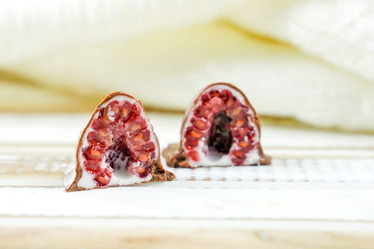 Chocolate-Dipped Raspberries cut into half