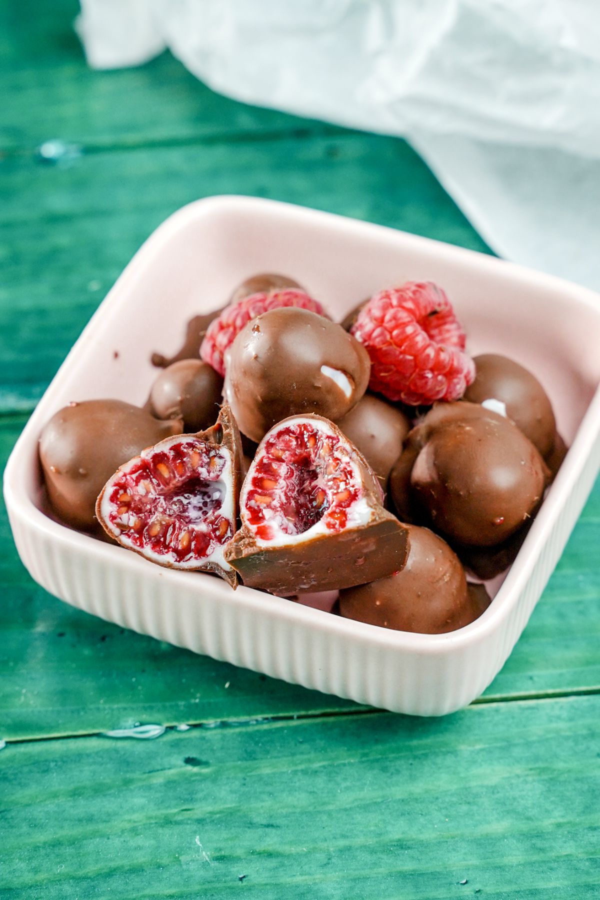 4 Ingredient Chocolate-Dipped Raspberries served in a bowl