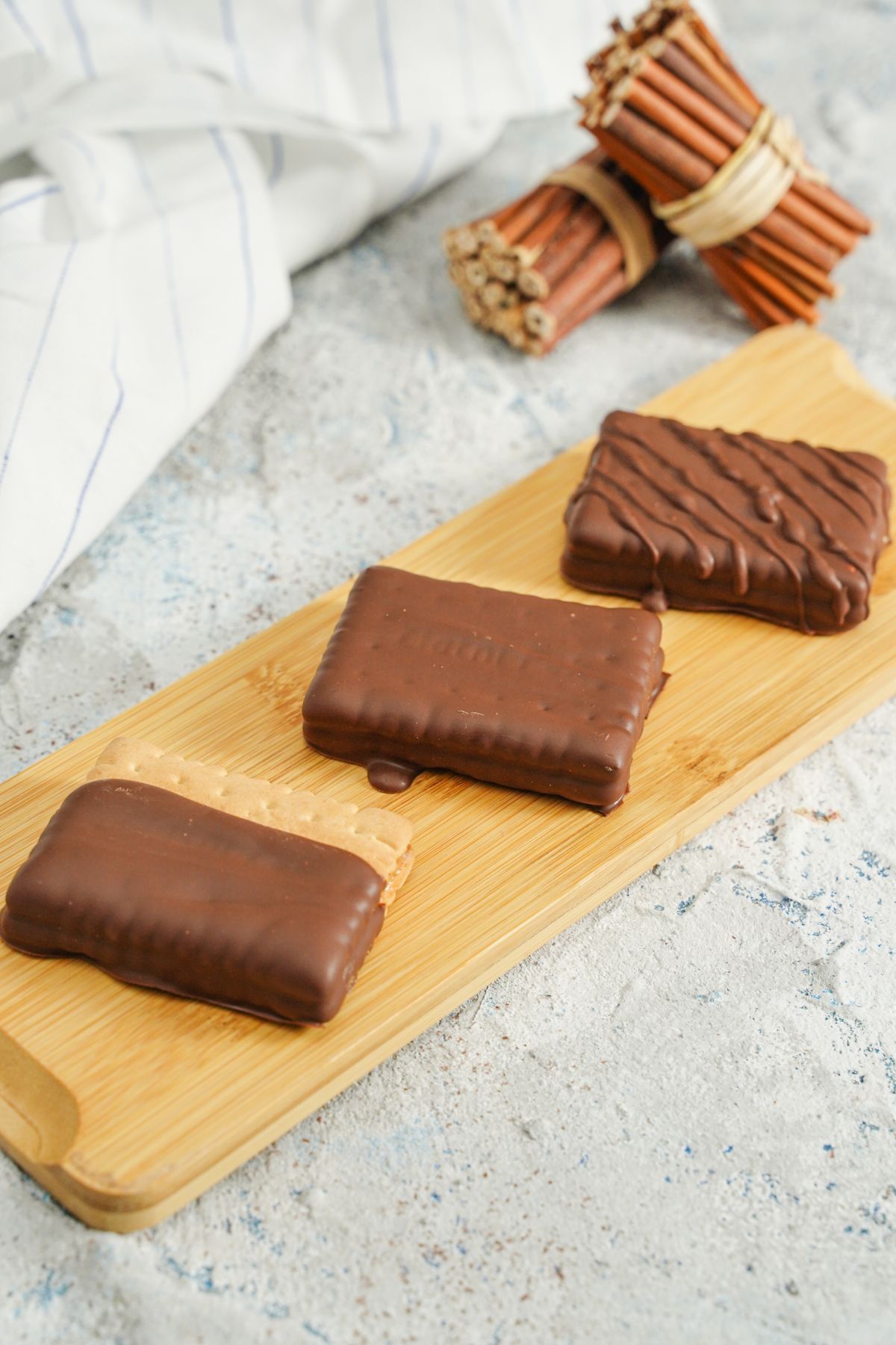 Homemade Peanut Butter Candy Bars served on a wooden plank