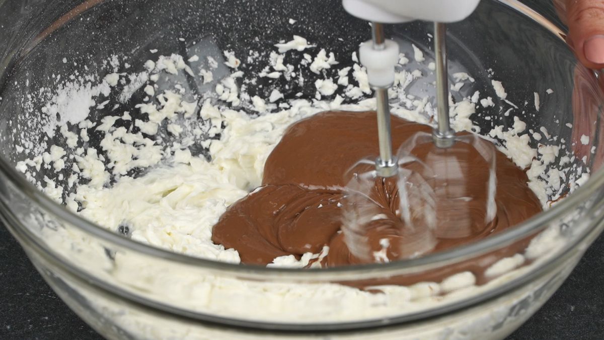 add the melted chocolate to the cream cheese mixture