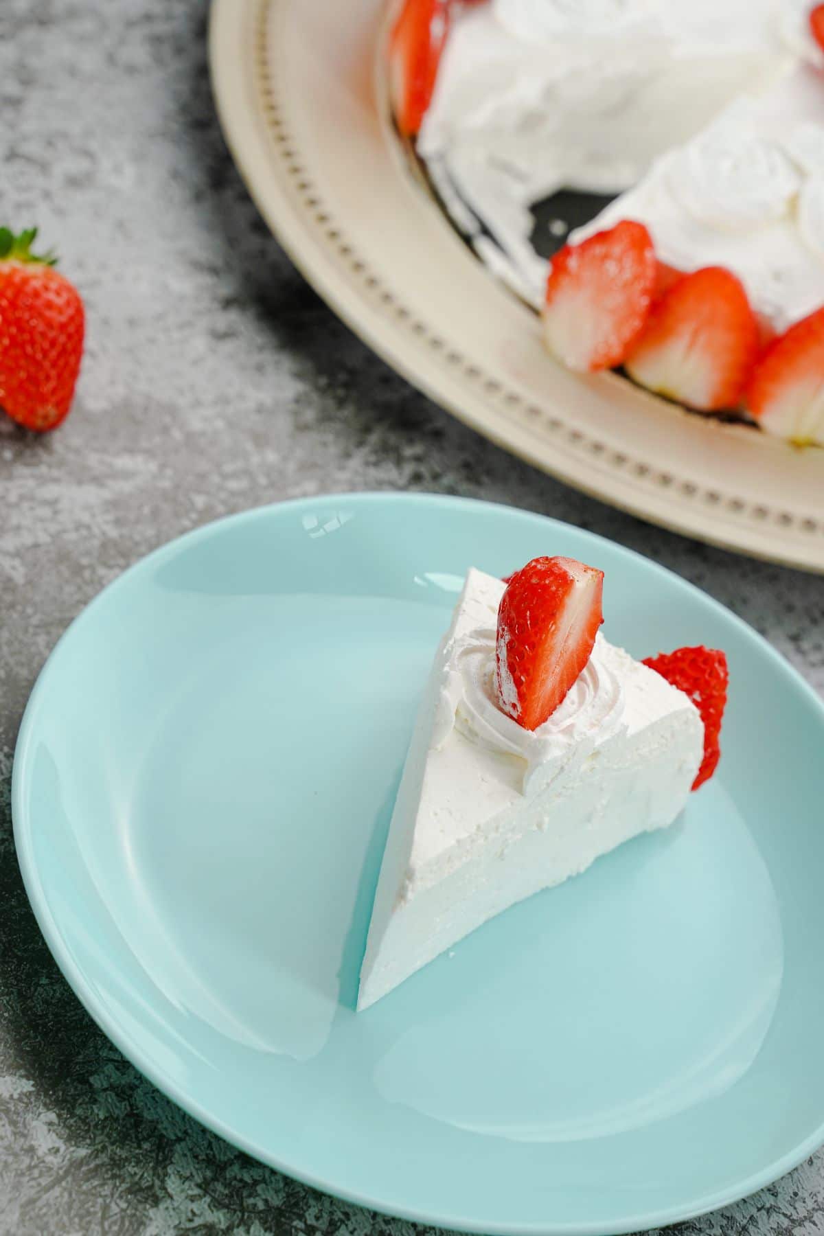 A slice of No-Bake Pavlova With Strawberries