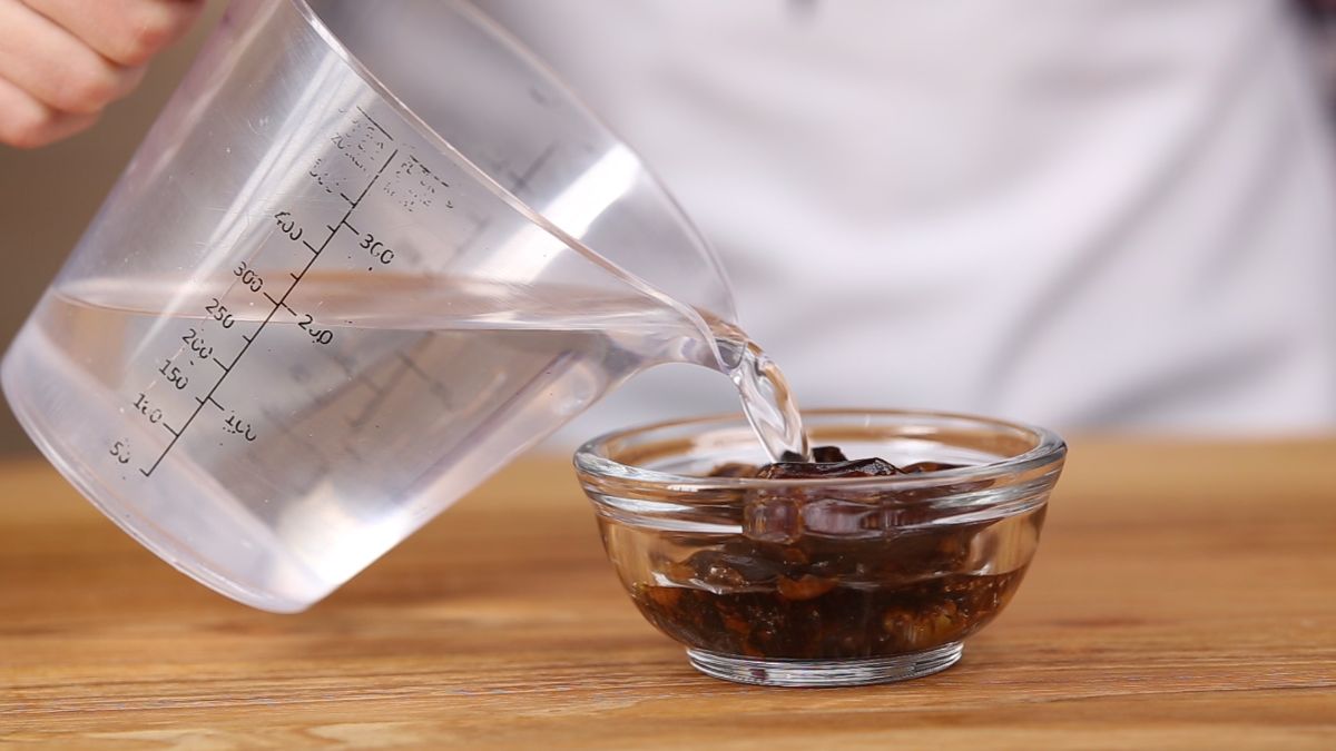 soak dates into the water in a bowl