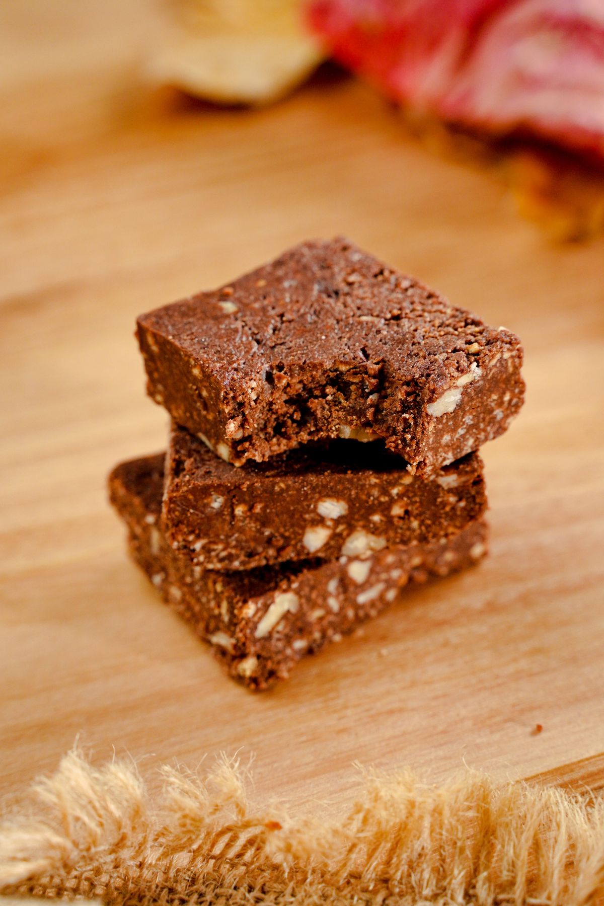 A bite taken from No-Bake Triple Chocolate Brownies