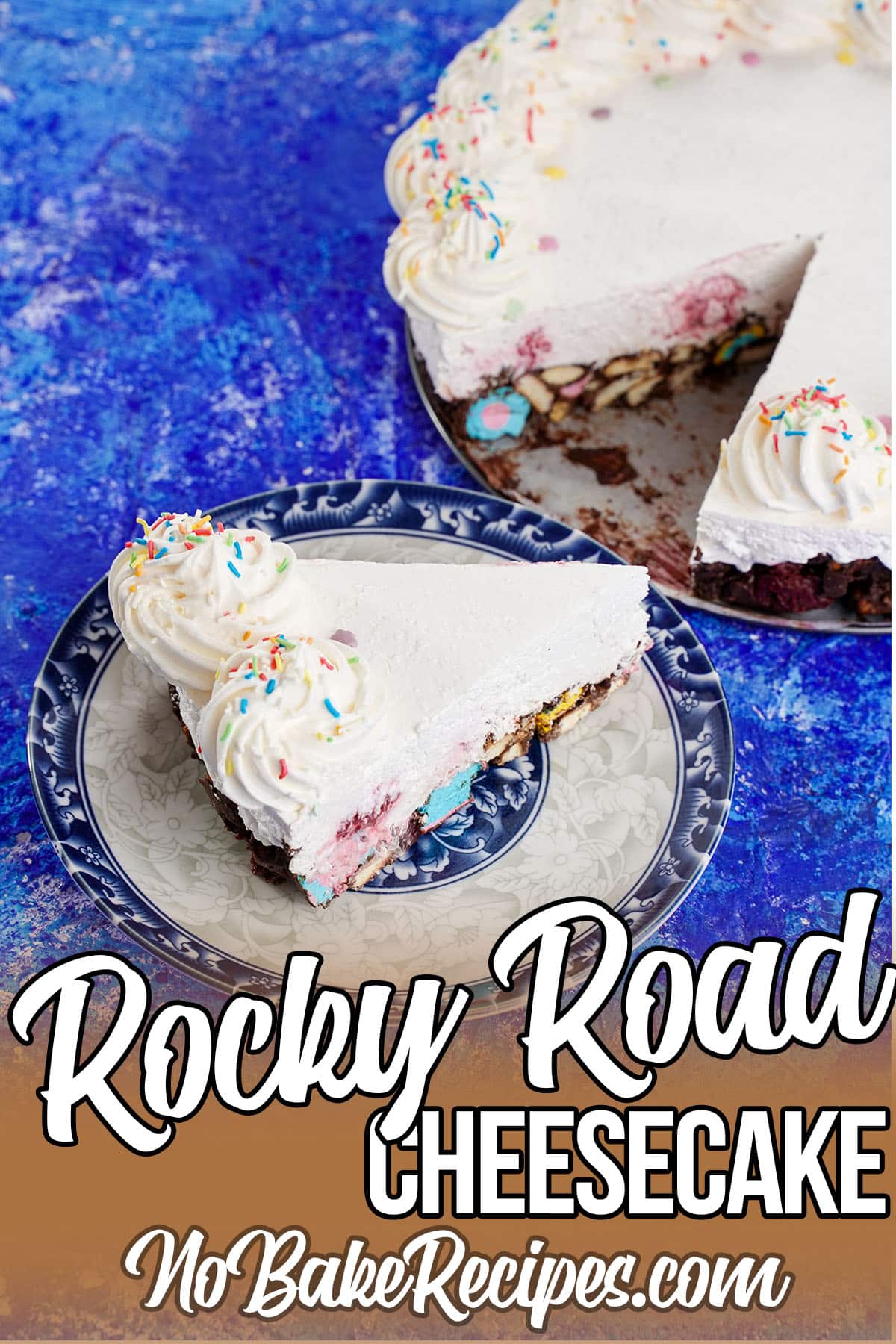slice of no-bake chocolate marshmallow cake on a plate with text which reads Rocky Road Cheesecake