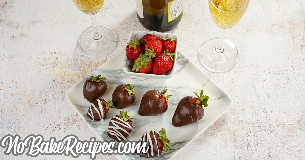 boozy chocolate covered strawberries on a plate
