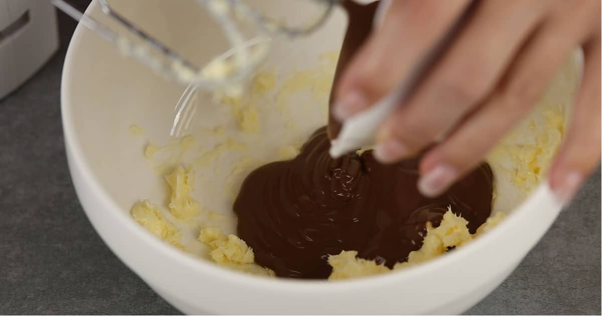 in-process step of mixing ingredients together to make chocolate rum truffles