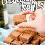easy chocolate truffles sitting on a plate with text which reads double chocolate champagne truffles