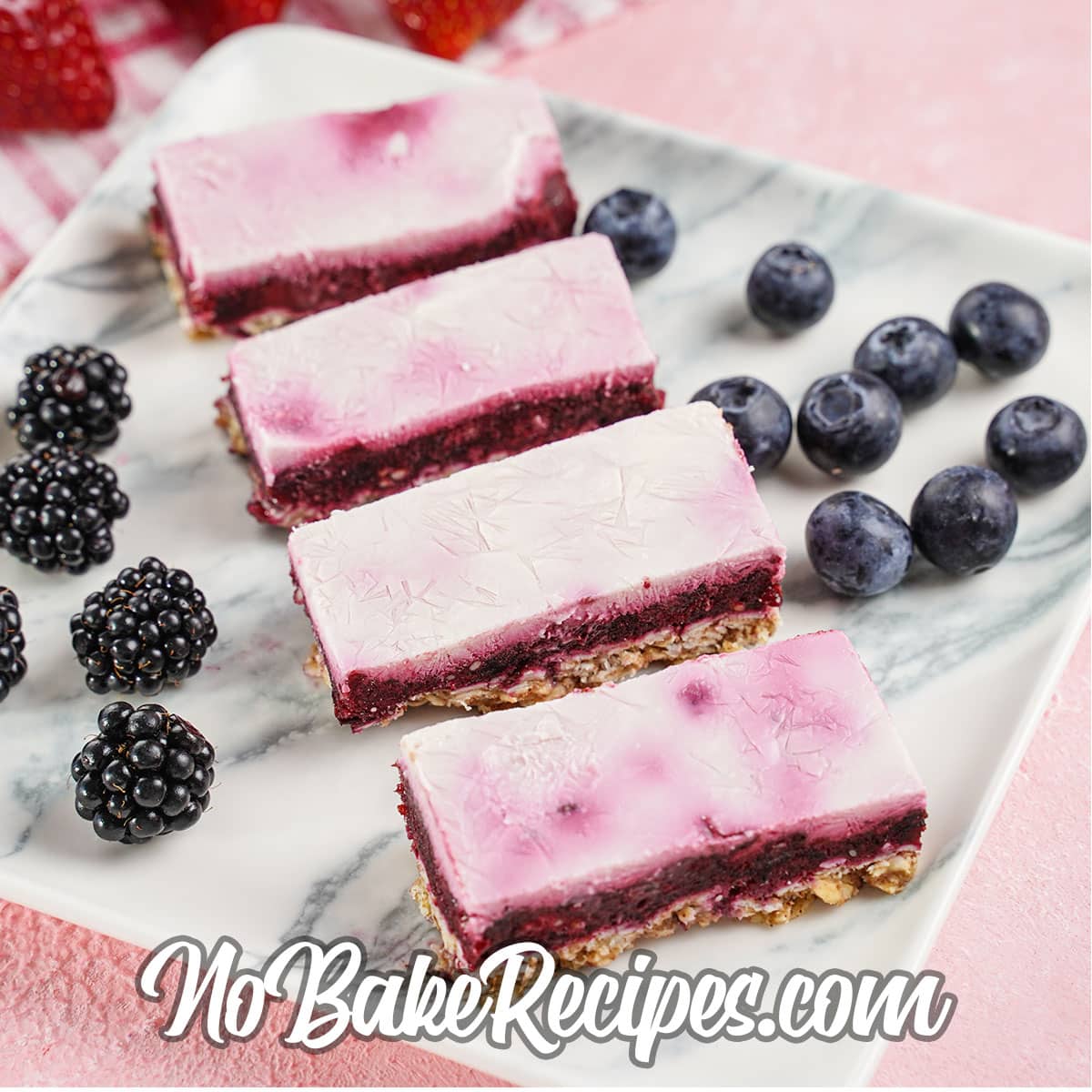 macerated berry frozen yogurt bars on a marble plate