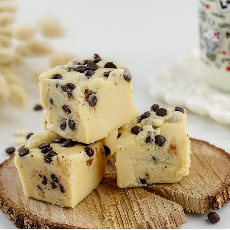 Cookie Dough Fudge on a wood round