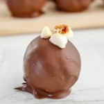 S'mores truffle on a white table