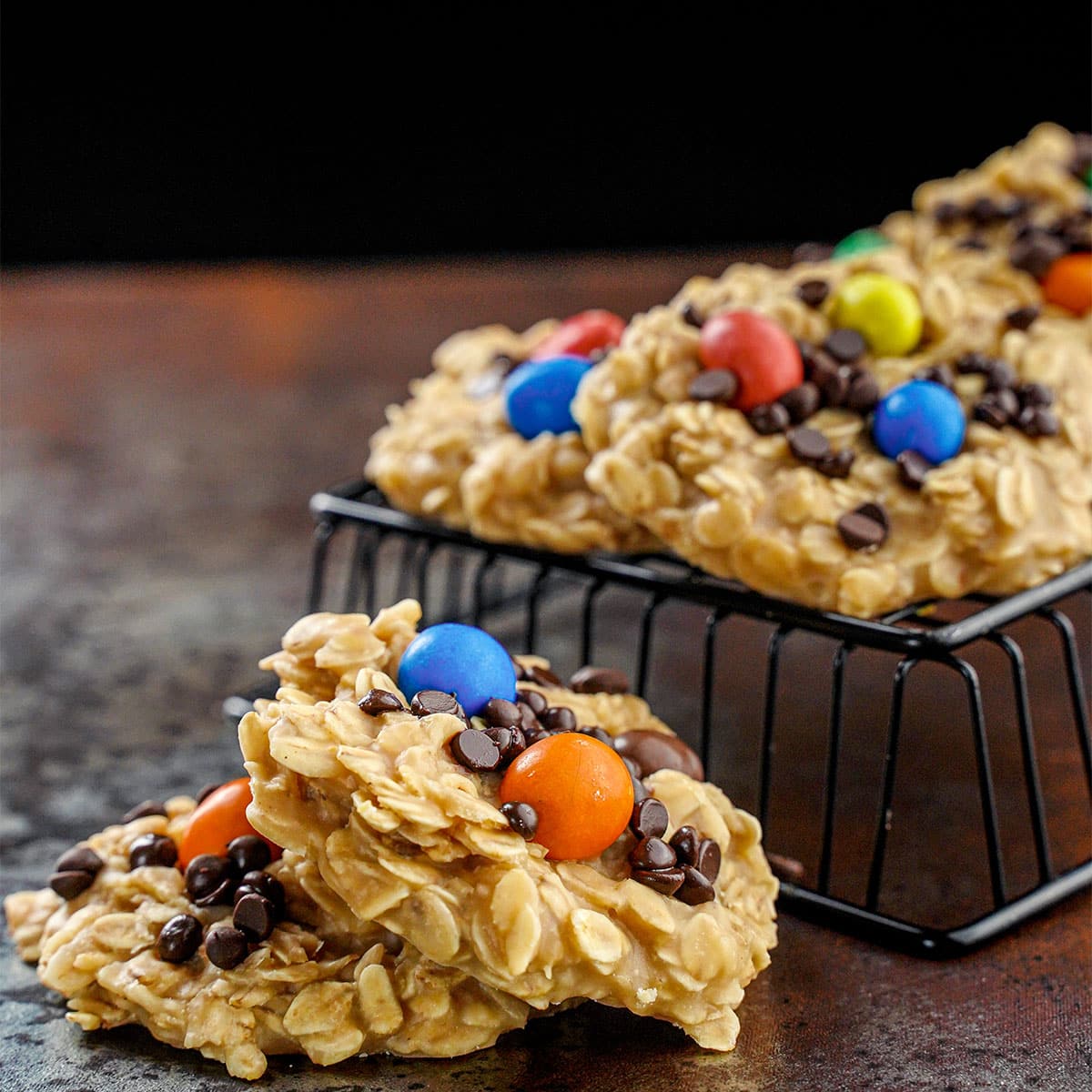 no-bake monster cookies on a tray and table