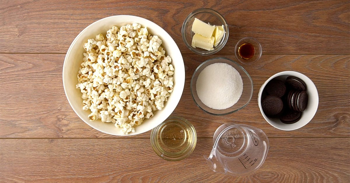 bowls of ingredients to make oreo popcorn balls