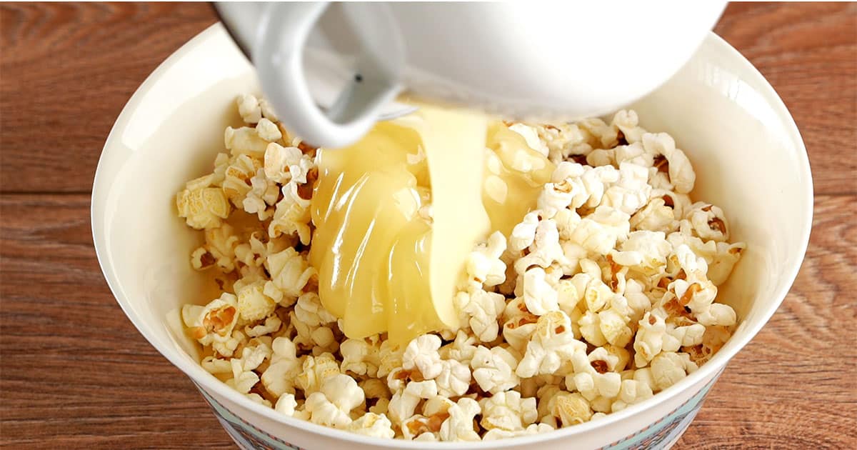 ingredients being combined to make popcorn balls