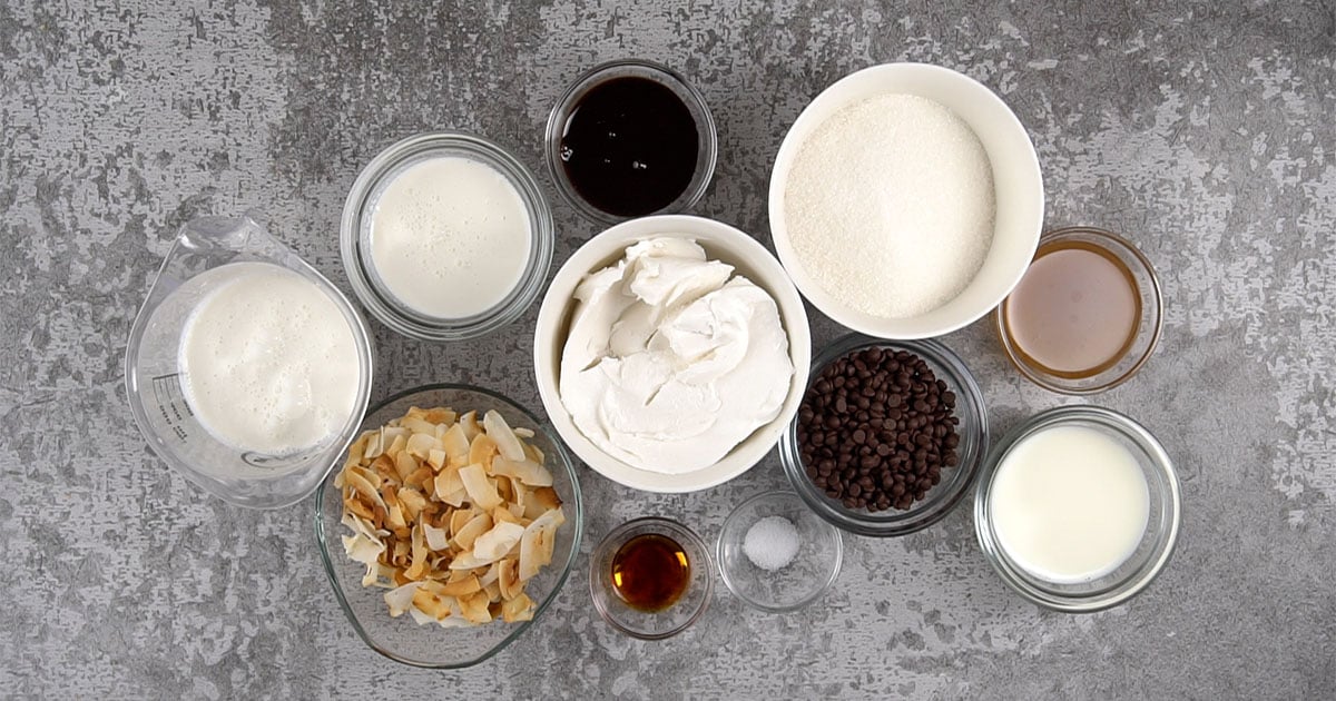 overhead view of bowls of ingredients to make samoa cheesecake dip