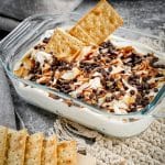 easy chocolate coconut caramel dip for dessert also known as samoa cheesecake dip