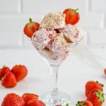 glass of strawberry cheesecake ice cream