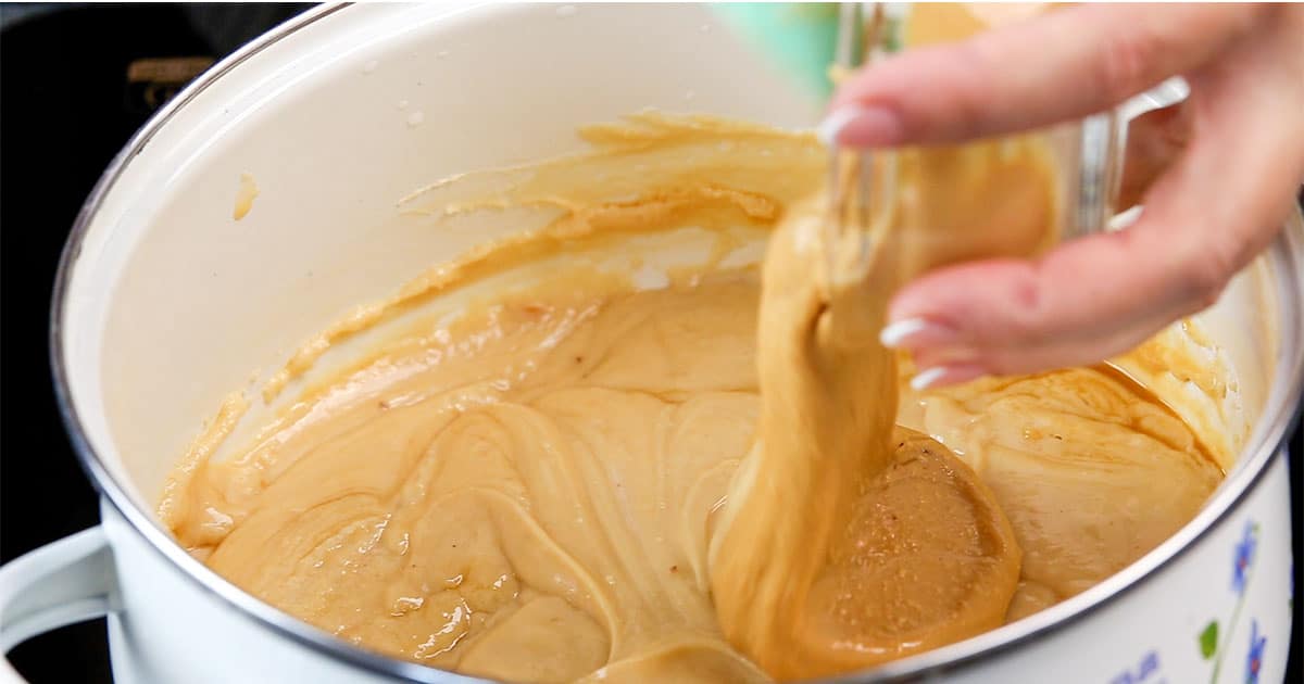 Mix in Creamy Peanut Butter to Fudge Mixture.